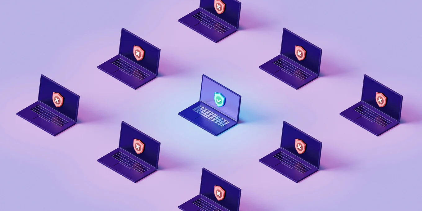 Laptops with shield icons in a circle.